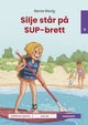 Silje står på SUP-brett