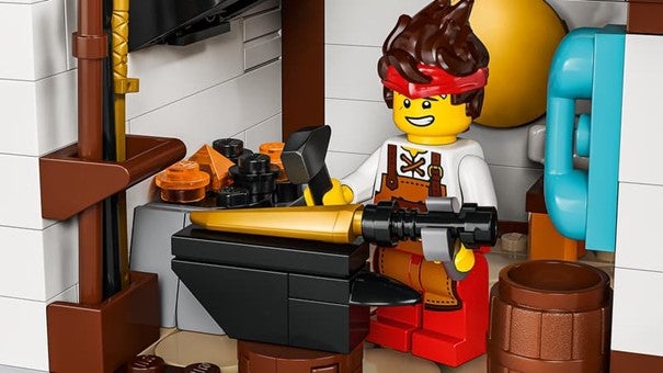 Lego 15-årsjubileumssett med 4 våpen-smia 71858