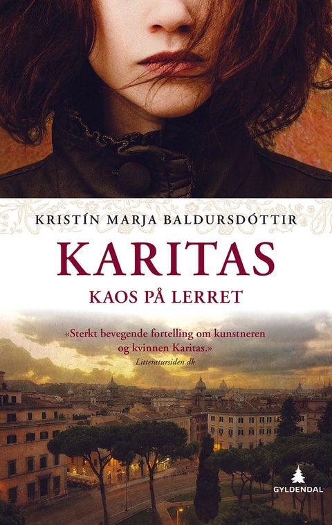 Karitas - kaos på lerret