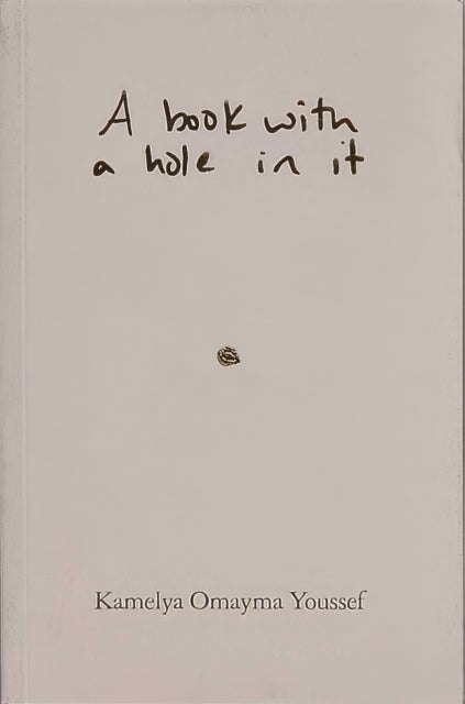 A book with a hole in it