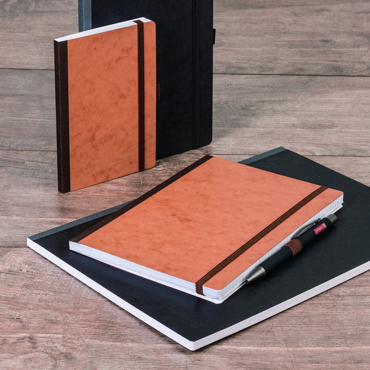 Notatbok Brunnen A5 Sort Linjert m/strikk