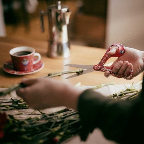 Saks universal Fiskars 21 cm Taika rød