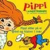 Pippi sitter på ei grind og klatrer i trær