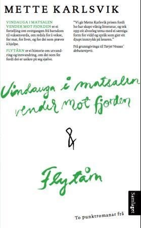 Vindauga i matsalen vender mot fjorden ; Flytårn