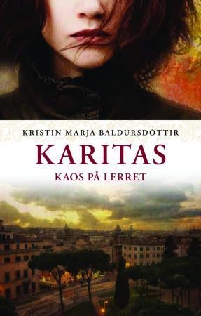 Karitas - kaos på lerret