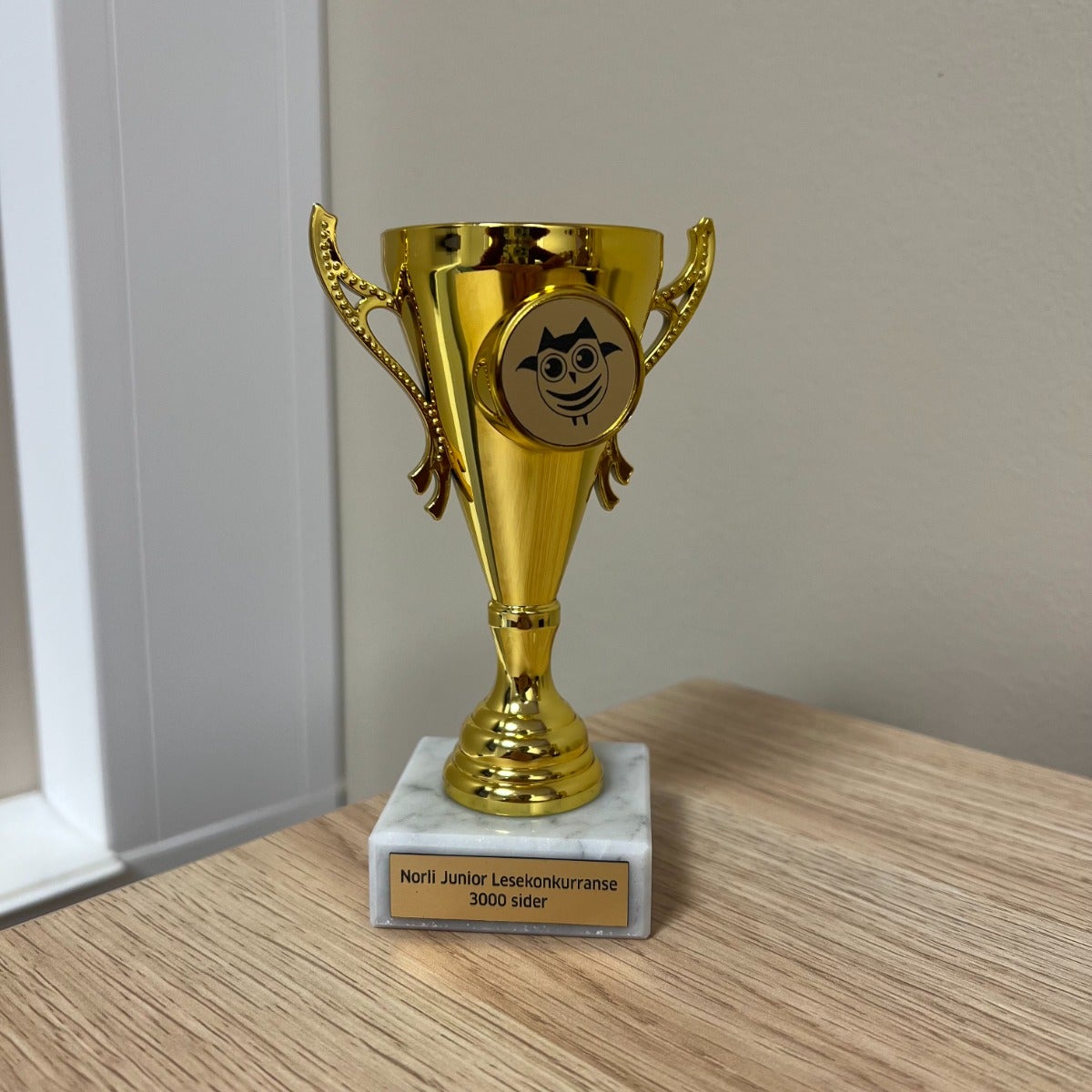 Pokal Norli Junior lesekonkurranse 3000 sider - Gullpokal