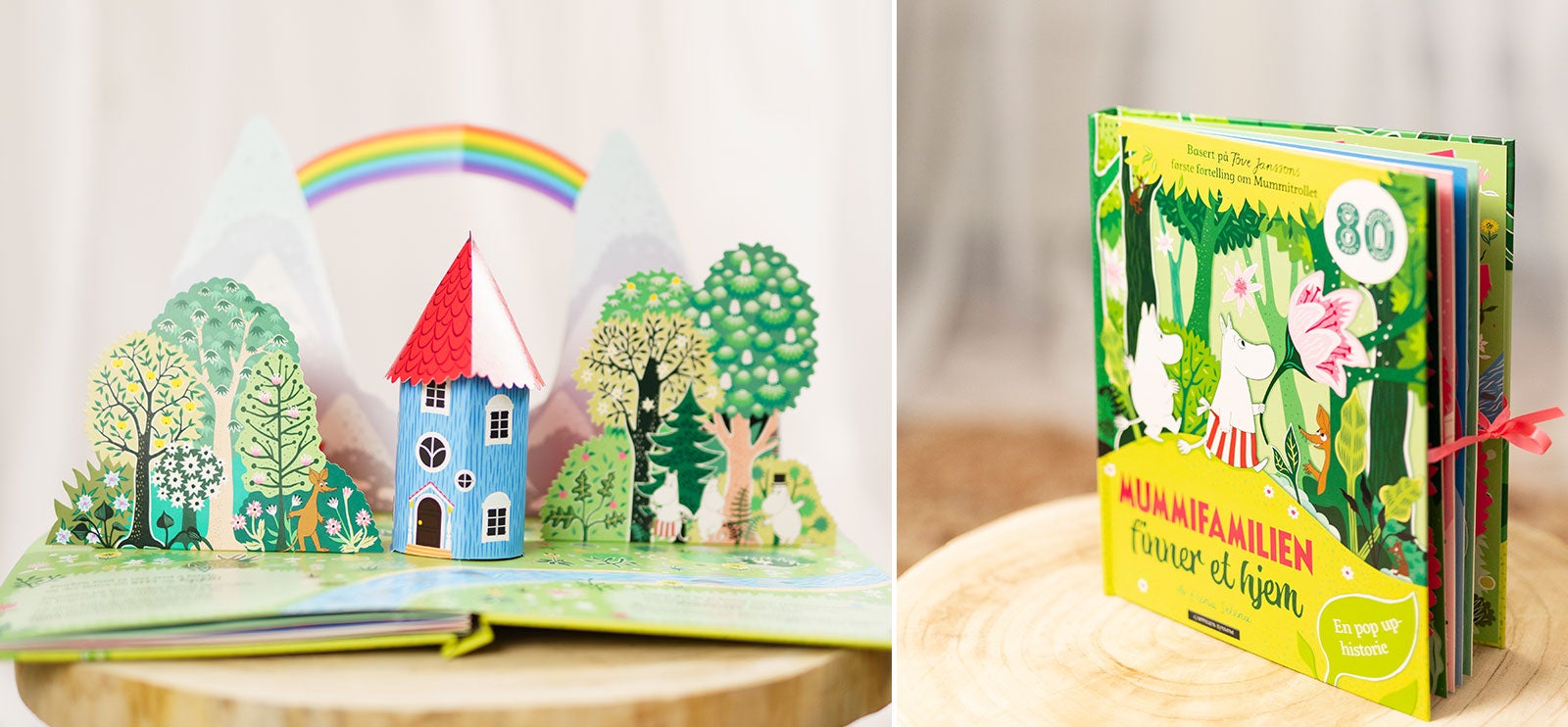 Mummifamilien finner et hjem, en vakker pop-up bok. Boken er grønn.